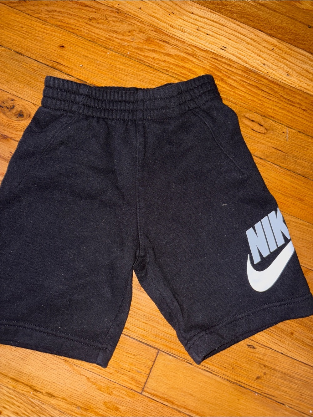 Nike Black Shorts with White Swoosh Logo